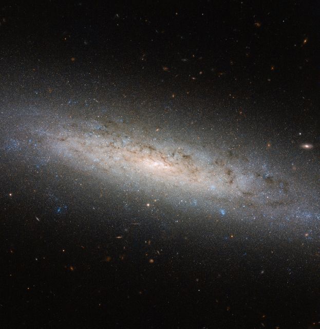 Hubble Explores the Hidden Dark Side of a Spiral Galaxy - Download Free Stock Photos Pikwizard.com