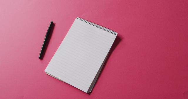 Image of pen and notebook with copy space on pink background - Download Free Stock Photos Pikwizard.com