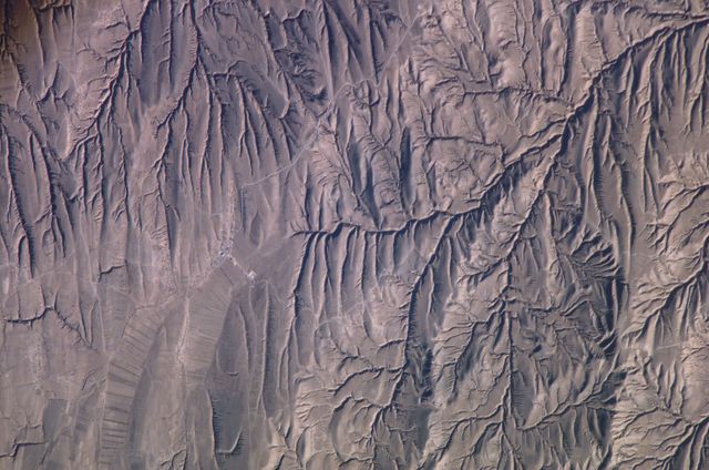 ISS010-E-22762 (3 April 2005) --- North Central China mountains are featured in this image photographed by an Expedition 10 crewmember on the International Space Station.