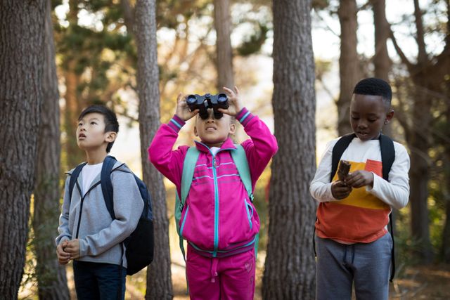 Kids looking through binoculars - Download Free Stock Photos Pikwizard.com