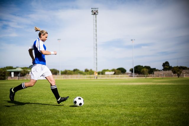 Female football player practicing soccer - Download Free Stock Photos Pikwizard.com