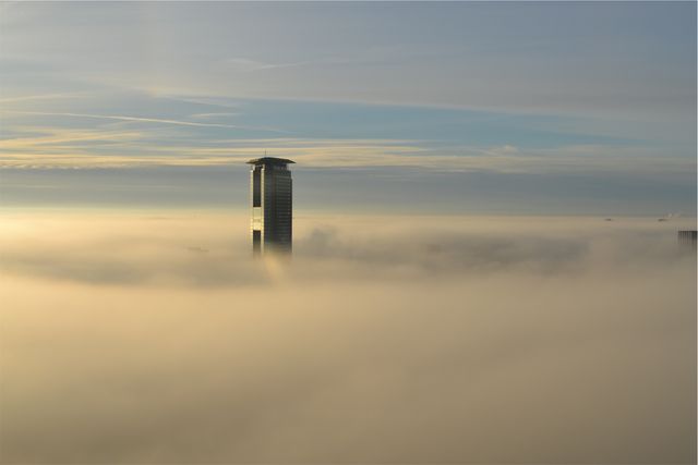 a tower in the fog - Download Free Stock Photos Pikwizard.com