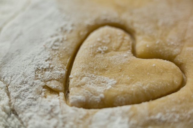 Close up of heart shape on dough - Download Free Stock Photos Pikwizard.com