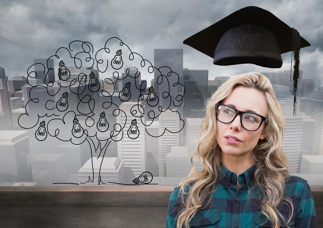 Thoughtful woman with graduation cap against cityscape in background - Download Free Stock Photos Pikwizard.com