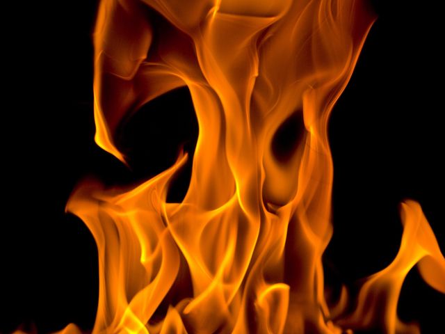 fire on a black background - Download Free Stock Photos Pikwizard.com
