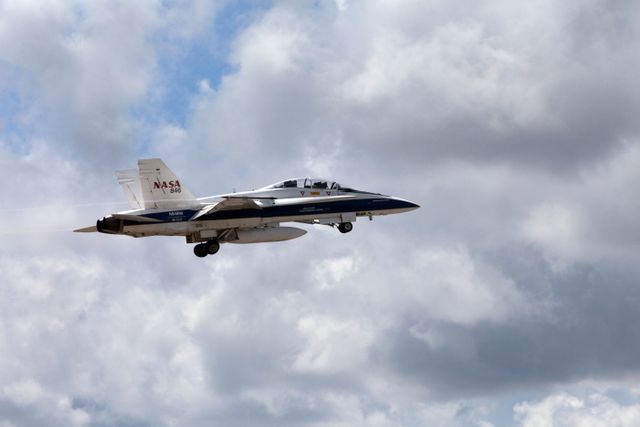 A NASA F-18 jet has taken off from the agency's Shuttle Landing Facility at NASA's Kennedy Space Center in Florida. Several flights a day have been taking place the week of Aug. 21, 2017 to measure the effects of sonic booms. It is part of NASA's Sonic Booms in Atmospheric Turbulence, or SonicBAT II Program. NASA at Kennedy is partnering with the agency's Armstrong Flight Research Center in California, Langley Research Center in Virginia, and Space Florida for a program in which F-18 jets will take off from the Shuttle Landing Facility and fly at supersonic speeds while agency researchers measure the effects of low-altitude turbulence caused by sonic booms.