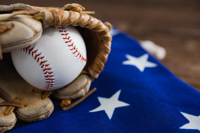 Baseball and gloves on an American flag - Download Free Stock Photos Pikwizard.com