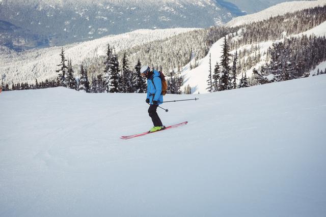 Skier skiing on snowy mountains - Download Free Stock Photos Pikwizard.com