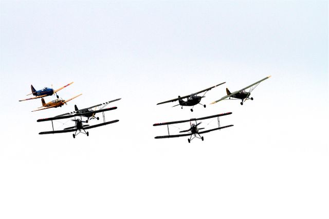 7 Biplane Flying on Air Under Clouds during Daytime - Download Free Stock Photos Pikwizard.com