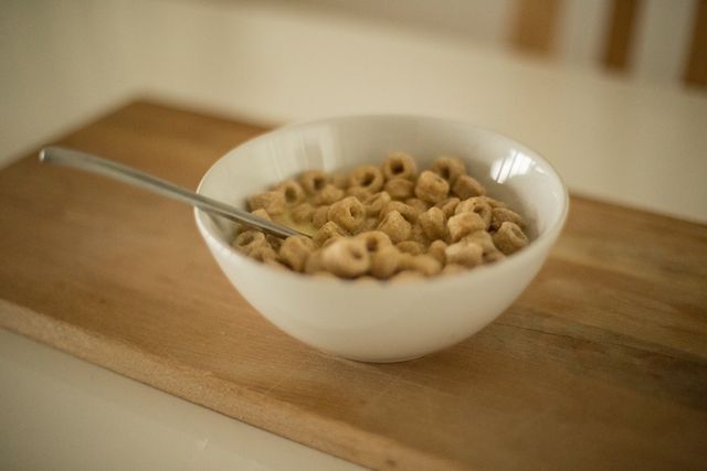 Cereal on White Ceramic Bowl With Spoon - Download Free Stock Photos Pikwizard.com