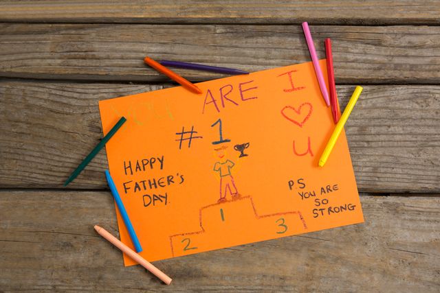 Fathers day greeting card with crayons on table - Download Free Stock Photos Pikwizard.com