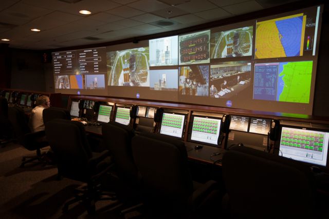 In the Hangar A&E control room, displays are seen during a dress rehearsal for the launch of the United Launch Alliance Delta IV Heavy rocket for the upcoming Orion Flight Test. Orion is the exploration spacecraft designed to carry astronauts to destinations not yet explored by humans, including an asteroid and Mars. It will have emergency abort capability, sustain the crew during space travel and provide safe re-entry from deep space return velocities. The first unpiloted flight test of Orion is scheduled to launch Dec. 4, 2014 atop a United Launch Alliance Delta IV Heavy rocket, and in 2018 on NASA’s Space Launch System rocket. 