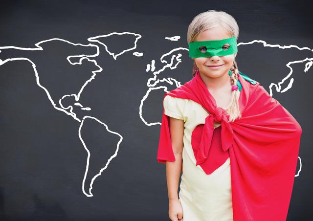 Superhero kid in red cape and green eye mask- Download Free Stock Photos Pikwizard.com