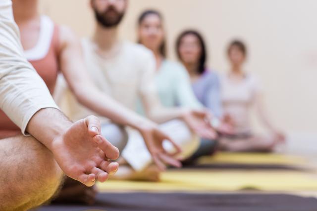 Group of people doing meditation on exercise mat - Download Free Stock Photos Pikwizard.com