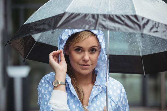 Portrait of beautiful woman holding umbrella - Download Free Stock Photos Pikwizard.com