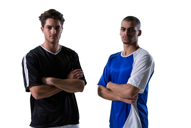 Two football players standing with arms crossed - Download Free Stock Photos Pikwizard.com