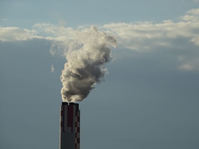 Smoke Stack Against Cloudy Sky - Download Free Stock Photos Pikwizard.com