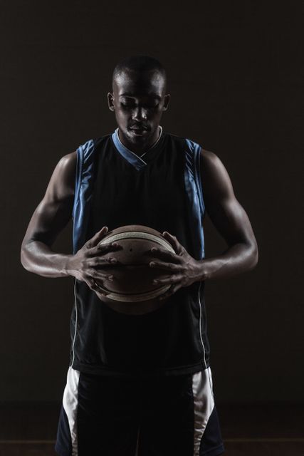 Portrait of basketball player holding a ball - Download Free Stock Photos Pikwizard.com