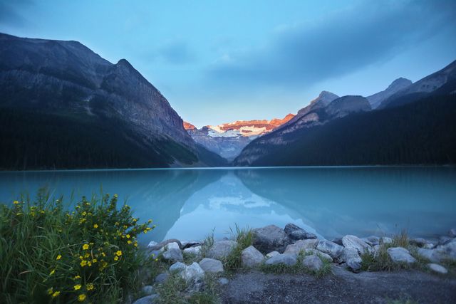 a mountain lake at sunset - Download Free Stock Photos Pikwizard.com