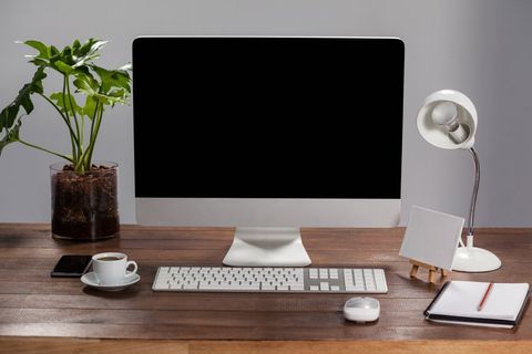 Office desk with pc, personal organizer, mobile phone and belongings - Download Free Stock Photos Pikwizard.com