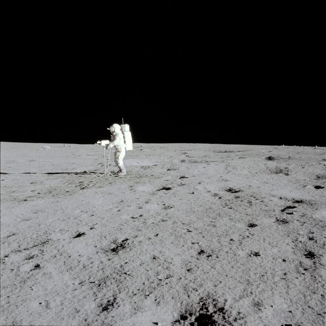 Apollo 14 Mission image - View of Astronaut Mitchell with a TV camera facing north.- Download Free Stock Photos Pikwizard.com