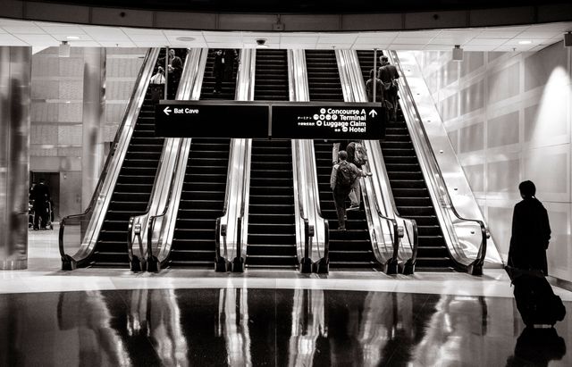 Airport escalator transportation  - Download Free Stock Photos Pikwizard.com