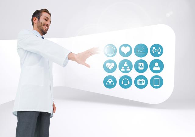Doctor touching digitally generated medical icons against white background - Download Free Stock Photos Pikwizard.com