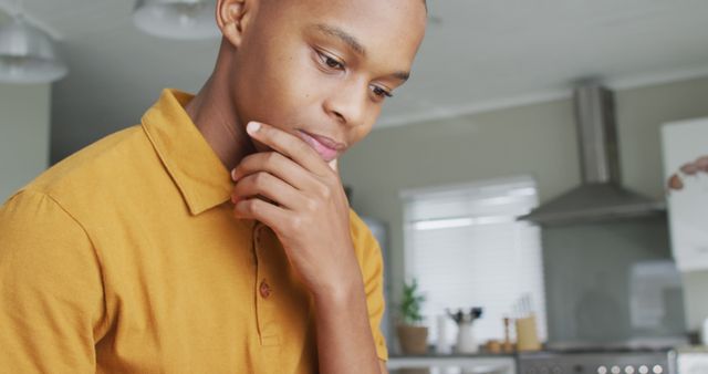 Image of sad african american boy using smartphone at home - Download Free Stock Photos Pikwizard.com