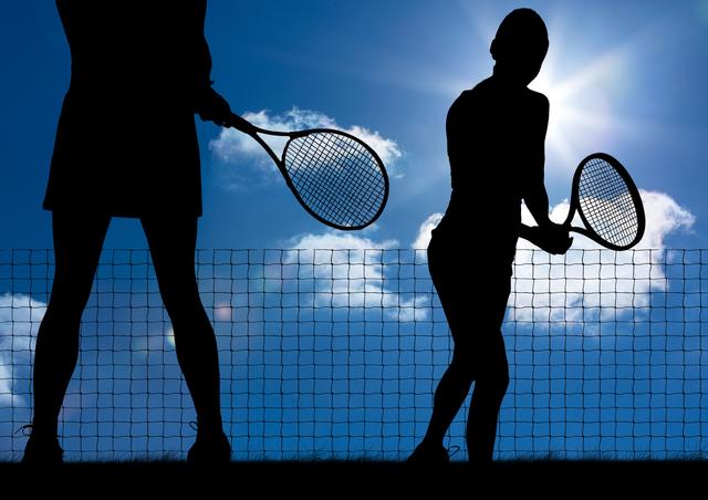 Silhouette of tennis player with rackets against sky background - Download Free Stock Photos Pikwizard.com