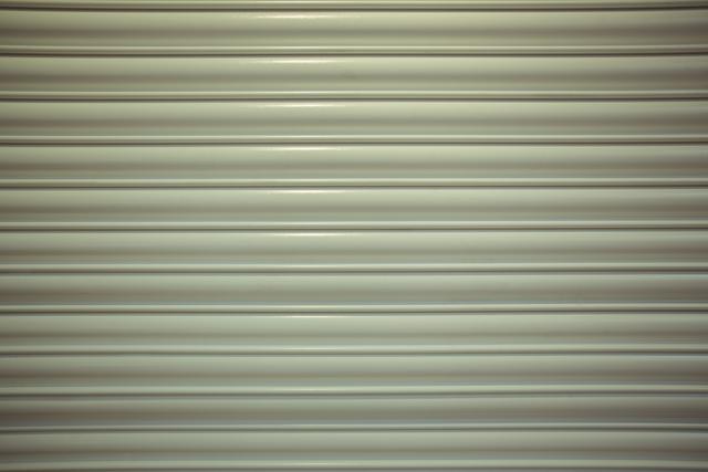 Close-up detail of closed metal security shutter - Download Free Stock Photos Pikwizard.com