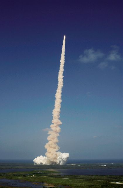 STS112-S-014 (7 October 2002) --- The Space Shuttle Atlantis shoots through the clear blue sky after launch on mission STS-112, the 15th assembly flight to the International Space Station. Liftoff from Launch Pad 39B occurred at 3:46 p.m. (EDT), October 7, 2002.. Atlantis carried the S1 Integrated Truss Structure and the Crew and Equipment Translation Aid (CETA) Cart A. The CETA is the first of two human-powered carts that will ride along the ISS railway, providing mobile work platforms for future spacewalking astronauts. On the 11-day mission,  three spacewalks were successful in attaching the S1 truss to the Station and performing other scheduled ISS work. The STS-112 crew members of Atlantis are   Jeffrey S. Ashby, commander; Pamela A. Melroy, pilot; and David A. Wolf, Piers J. Sellers, Sandra H. Magnus and Rosaviakosmos' Fyodor N. Yurchikhin, all mission specialists.