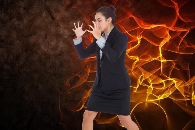 Angry businesswoman with fire - Download Free Stock Photos Pikwizard.com