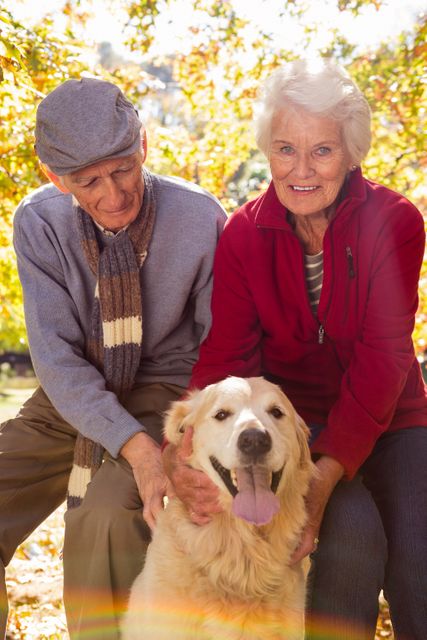 Portrait of elderly couple with their pet dog  - Download Free Stock Photos Pikwizard.com