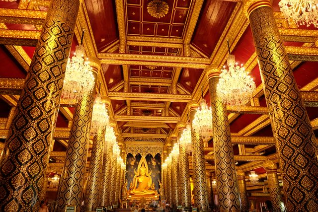 a large room with gold pillars - Download Free Stock Photos Pikwizard.com