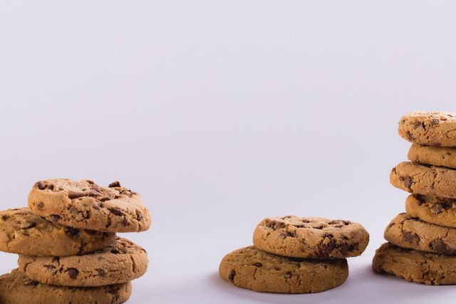 Stack of cookies over white background with copy space - Download Free Stock Photos Pikwizard.com