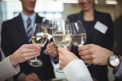 Businesspeople toasting glasses of champagne - Download Free Stock Photos Pikwizard.com