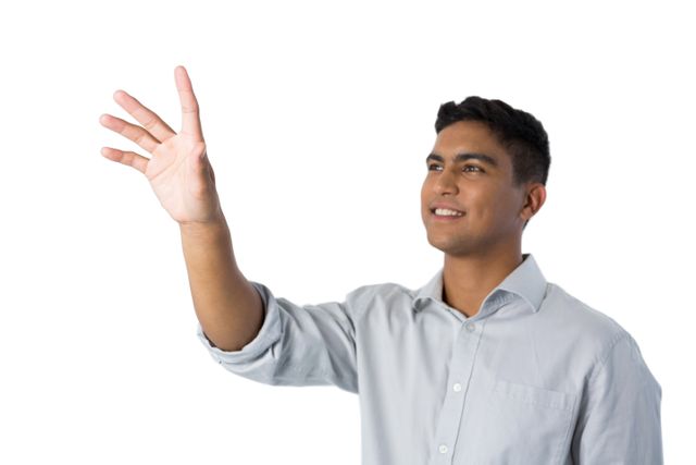 Man pretending to touch an invisible screen - Download Free Stock Photos Pikwizard.com