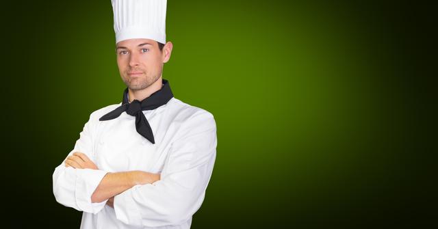 Portrait of chef standing with arms crossed against green background - Download Free Stock Photos Pikwizard.com