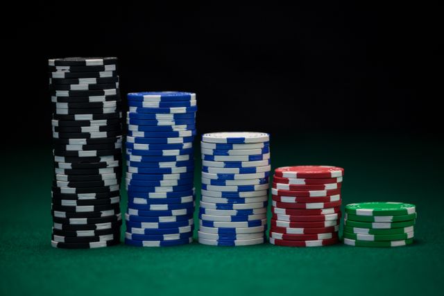 Casino chips arranged on poker table - Download Free Stock Photos Pikwizard.com