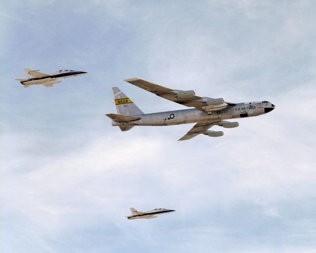 NASA's B-52B mothership, escorted by two F-18s, makes a final flyover after its last research mission that launched the X-43A on its record Mach 9.6 flight - Download Free Stock Photos Pikwizard.com