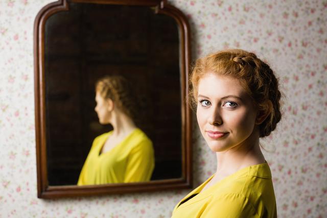 Woman standing in front of mirror - Download Free Stock Photos Pikwizard.com