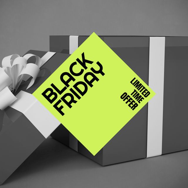 Composition of black friday text on green sign over present with ribbon. Black friday, christmas shopping, sales and retail concept digitally generated image.