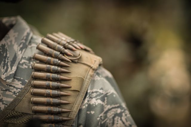 Close-up of military soldiers wearing ammunition - Download Free Stock Photos Pikwizard.com