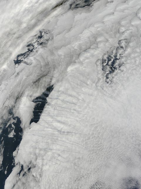 High-altitude aircraft leave behind condensation trails, or contrails, which form when extra water vapor is injected into the atmosphere through the aircraft's exhaust. On February 9, 2015, the Moderate Resolution Imaging Spectroradiometer (MODIS) on NASA’s Terra satellite captured this image of contrails above clouds over the North Atlantic Ocean.  NASA image courtesy Jeff Schmaltz, LANCE MODIS Rapid Response Team at NASA GSFC. Caption by Kathryn Hansen.  Via: <b><a href="http://www.earthobservatory.nasa.gov/" rel="nofollow"> NASA Earth Observatory</a></b>   <b><a href="http://www.nasa.gov/audience/formedia/features/MP_Photo_Guidelines.html" rel="nofollow">NASA image use policy.</a></b>  <b><a href="http://www.nasa.gov/centers/goddard/home/index.html" rel="nofollow">NASA Goddard Space Flight Center</a></b> enables NASA’s mission through four scientific endeavors: Earth Science, Heliophysics, Solar System Exploration, and Astrophysics. Goddard plays a leading role in NASA’s accomplishments by contributing compelling scientific knowledge to advance the Agency’s mission. <b>Follow us on <a href="http://twitter.com/NASAGoddardPix" rel="nofollow">Twitter</a></b> <b>Like us on <a href="http://www.facebook.com/pages/Greenbelt-MD/NASA-Goddard/395013845897?ref=tsd" rel="nofollow">Facebook</a></b> <b>Find us on <a href="http://instagram.com/nasagoddard?vm=grid" rel="nofollow">Instagram</a></b>