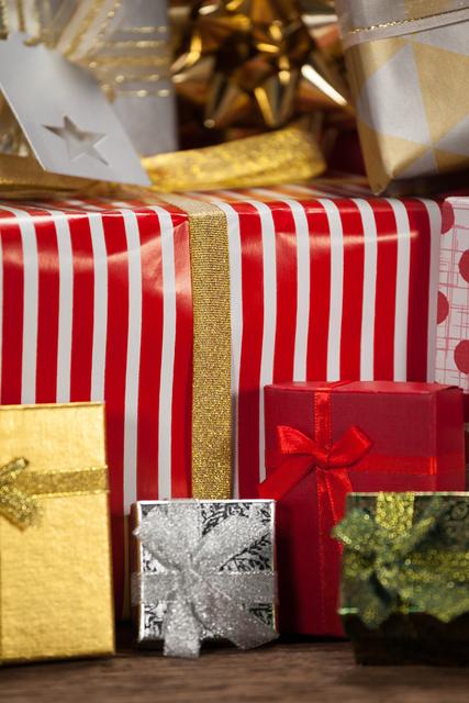 Close-up of various wrapped gift box on wooden table - Download Free Stock Photos Pikwizard.com