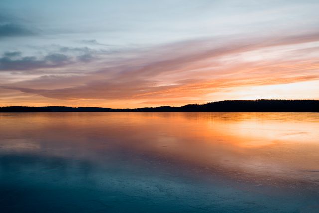 a lake at sunset - Download Free Stock Photos Pikwizard.com