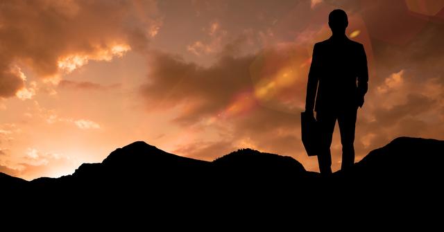 Silhouette businessman standing on mountain during sunset - Download Free Stock Photos Pikwizard.com
