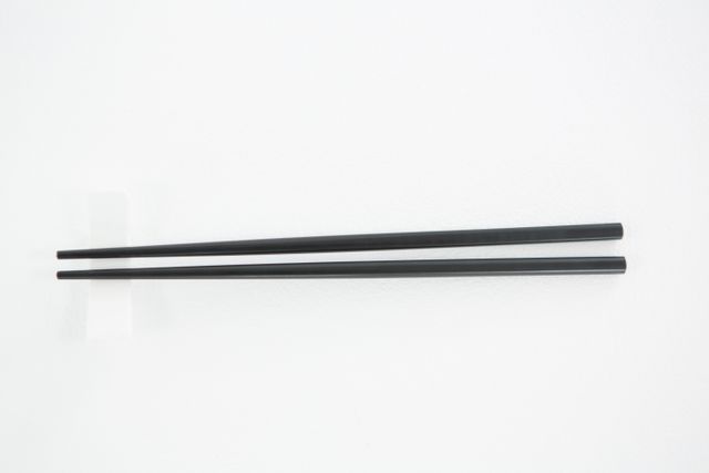 Chopsticks on a white background - Download Free Stock Photos Pikwizard.com