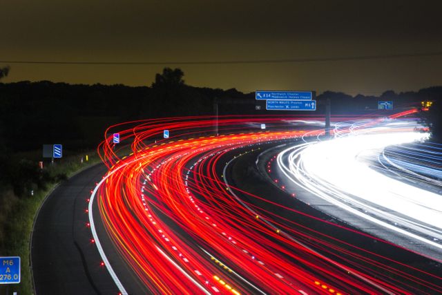 Time Lapse Photography of Car Passing by the Winding Road during Nighttime - Download Free Stock Photos Pikwizard.com