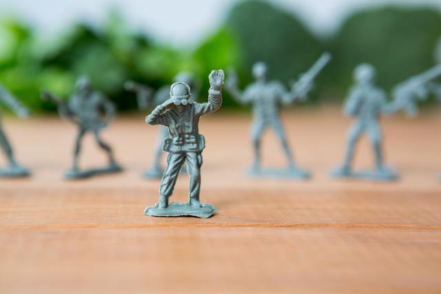 Miniature figurine of army soldier with binoculars - Download Free Stock Photos Pikwizard.com